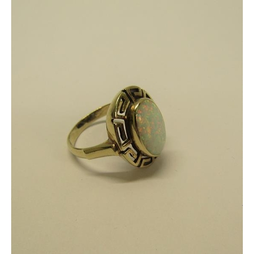 139 - A 14ct gold opal set ring, 5.7g overall, size P.