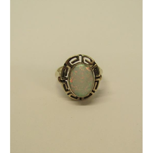 139 - A 14ct gold opal set ring, 5.7g overall, size P.