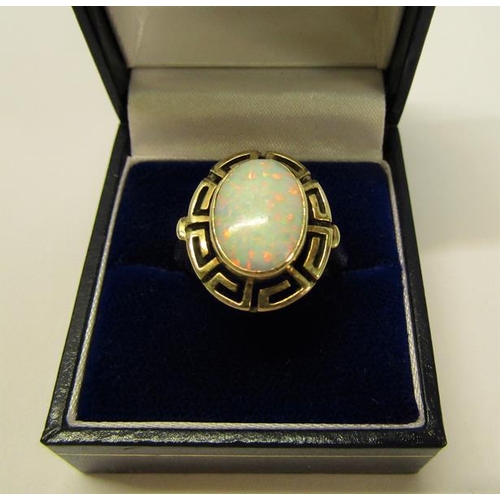 139 - A 14ct gold opal set ring, 5.7g overall, size P.