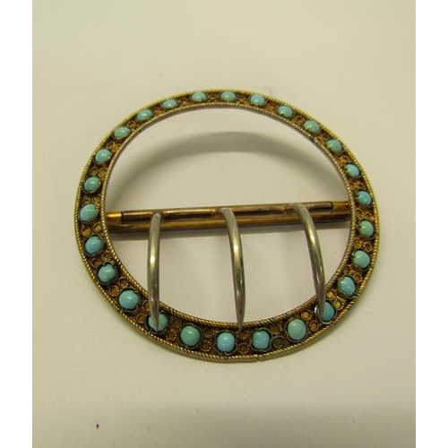 157 - An Edwardian period Continental .800 std silver gilt buckle of circular form set with turquoise bead... 