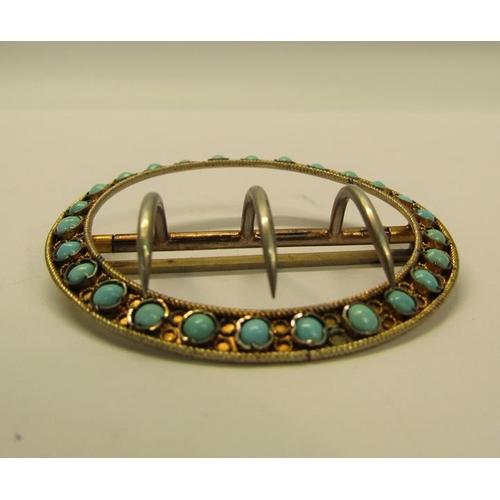 157 - An Edwardian period Continental .800 std silver gilt buckle of circular form set with turquoise bead... 