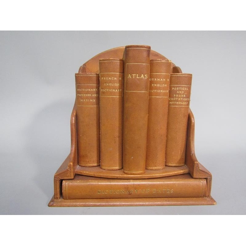 1 - An early 20c Fortnum & Mason brown leather bound reference library of six books comprising a Diction... 