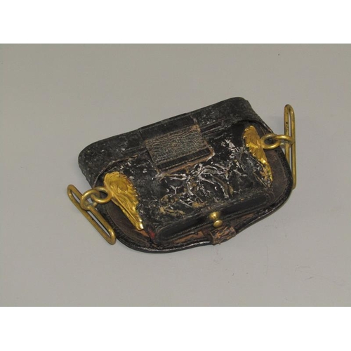 3 - A 19c Artillery officers black leather pouch, the flap with a brass field gun and having leaf moulde... 