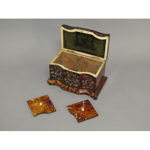 38 - A late Georgian tortoiseshell two compartment tea caddy of serpentine form, the front panels with mo... 