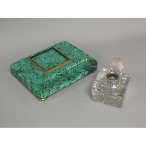 40 - A 19c malachite ink stand supporting a cut glass well with a hinged malachite mounted cover within a... 