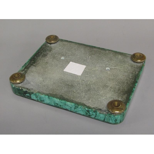 40 - A 19c malachite ink stand supporting a cut glass well with a hinged malachite mounted cover within a... 