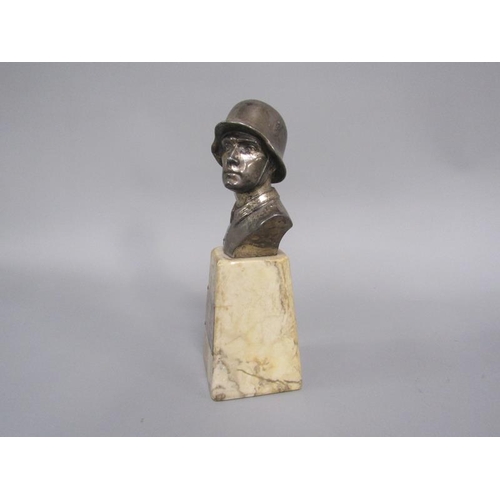 42 - A 1930's German presentation sculpture of a German Officer of the period, supported on a marble base... 