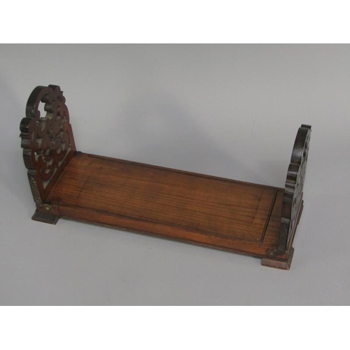 58 - A Victorian rosewood groove book slide with Royal Letters Patent to base, 53cm w open and having hin... 