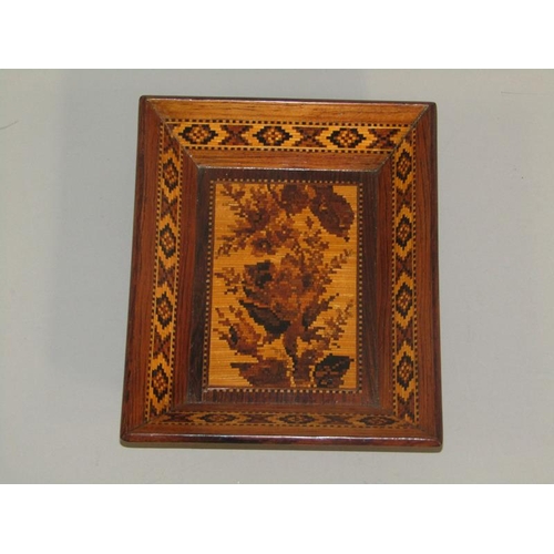 62 - A Tunbridgeware rosewood pin tray with a central panel of blossoming tree within a chequer outer bor... 