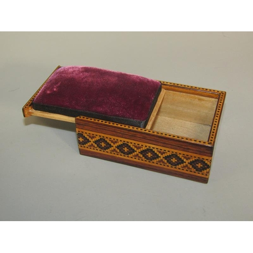 63 - A late 19c/early 20c Tunbridgeware rosewood pin box with a pin cushion sliding cover, the box decora... 