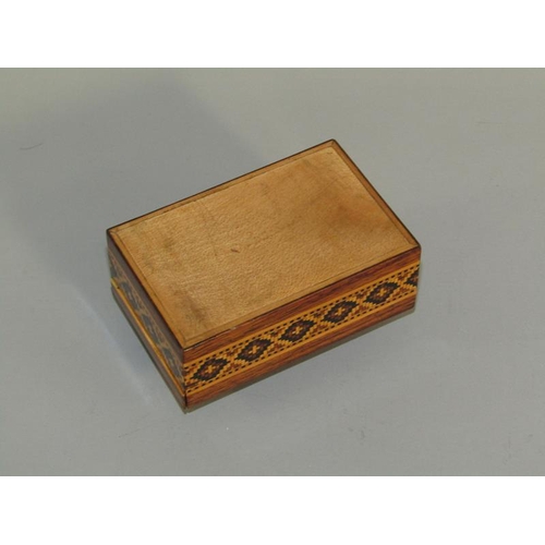 63 - A late 19c/early 20c Tunbridgeware rosewood pin box with a pin cushion sliding cover, the box decora... 