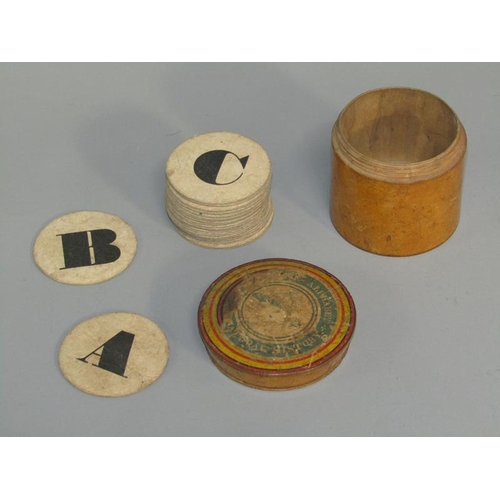 65 - A late 19c/early 20c box wood boxed set of alphabet natural history counters 5cm diam, the cylindric... 