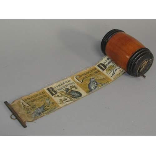 66 - A late 19c/early 20c painted silk alphabetical winding roller, the descriptions when joined forming ... 