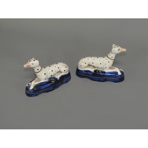 268 - A pair of 19c Staffordshire greyhound penholder figures on shaped cobalt blue bases, each 9.5cm h.