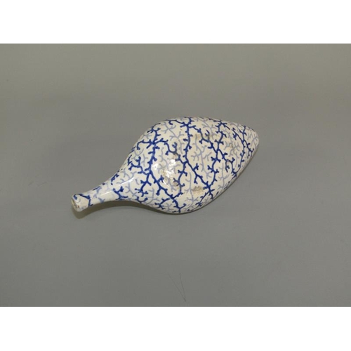 269 - A 19c oval blue and white feeding bottle with seaweed decoration, 19cm l.