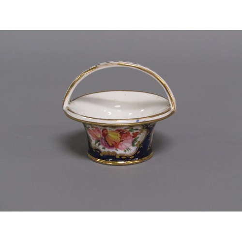 273 - An early 19c porcelain basket painted with floral reserves on a dark blue ground and having gilt lin... 