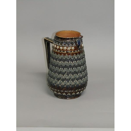 289 - A Doulton Lambeth stoneware jug with applied leaf and beadwork decoration by Emily W. Mayne 1881, 22... 