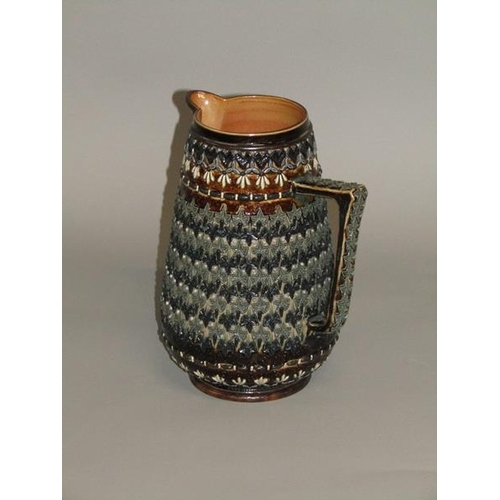 289 - A Doulton Lambeth stoneware jug with applied leaf and beadwork decoration by Emily W. Mayne 1881, 22... 