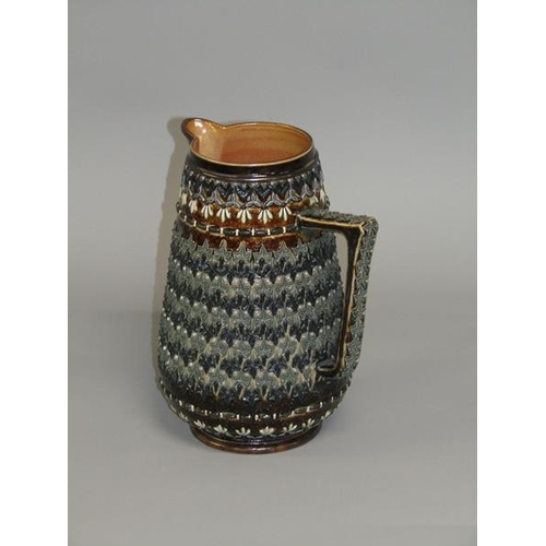 289 - A Doulton Lambeth stoneware jug with applied leaf and beadwork decoration by Emily W. Mayne 1881, 22... 