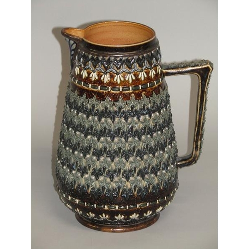 289 - A Doulton Lambeth stoneware jug with applied leaf and beadwork decoration by Emily W. Mayne 1881, 22... 