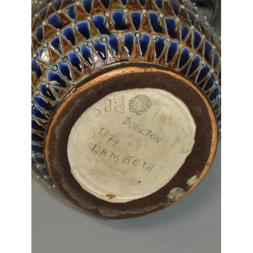 290 - A late 19c Doulton Lambeth stoneware jug with incised scale decoration and applied beadwork, 26cm h.