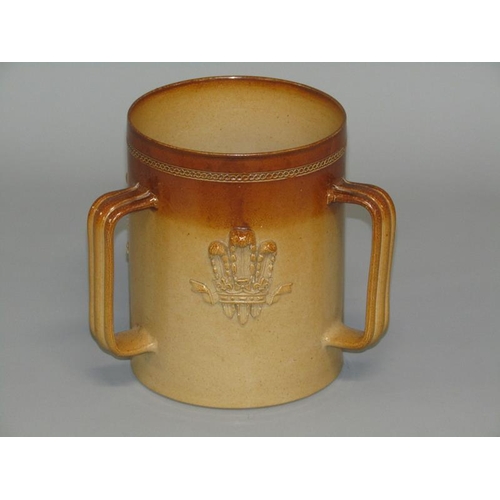 293 - A Doulton Lambeth stoneware three handled Prince of Wales tyg retailed by John Mortlock & Co, impres... 