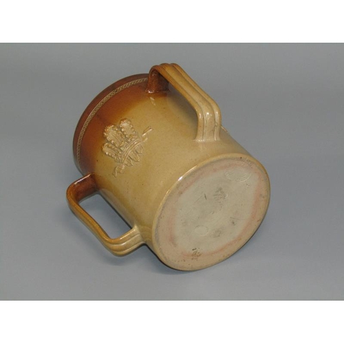 293 - A Doulton Lambeth stoneware three handled Prince of Wales tyg retailed by John Mortlock & Co, impres... 