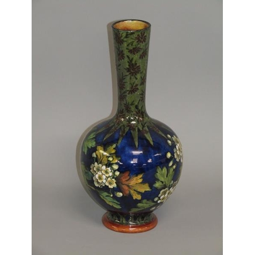 294 - A Doulton Lambeth faience vase by Alice Shelley of baluster form decorated with flowers and blossom,... 