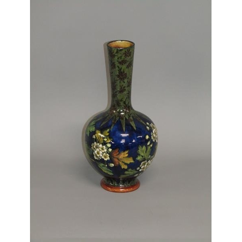 294 - A Doulton Lambeth faience vase by Alice Shelley of baluster form decorated with flowers and blossom,... 