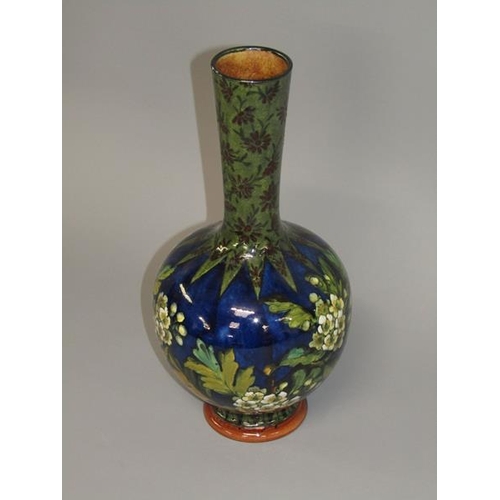 294 - A Doulton Lambeth faience vase by Alice Shelley of baluster form decorated with flowers and blossom,... 