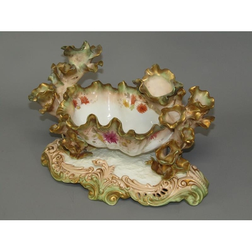 272 - A 19c Moore centre piece bowl with leaf candle holders on a shaped and pierced base decorated with f... 