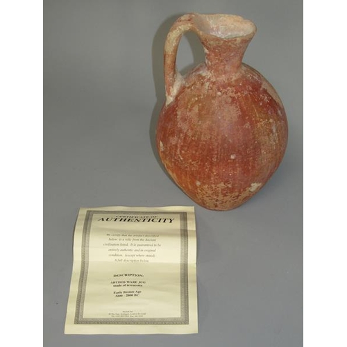 284 - A Abydos ware terracotta jug, early bronze age 3200/2800 BC, 26cm h.