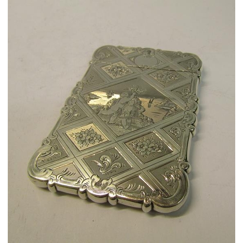 212 - A mid Victorian silver visiting card case, diamond panels chased with a central panel depicting a ch... 