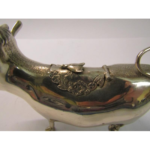 215 - A silver cow creamer, makers mark for Reid & Sons Ltd, London 1962, 5.2ozt, 15cm w.