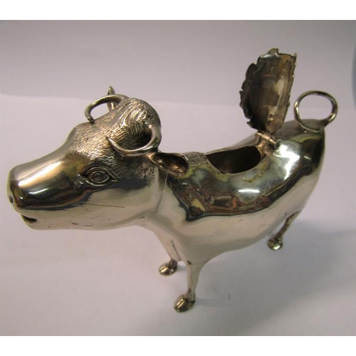 215 - A silver cow creamer, makers mark for Reid & Sons Ltd, London 1962, 5.2ozt, 15cm w.