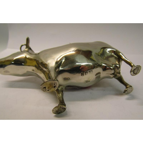 215 - A silver cow creamer, makers mark for Reid & Sons Ltd, London 1962, 5.2ozt, 15cm w.