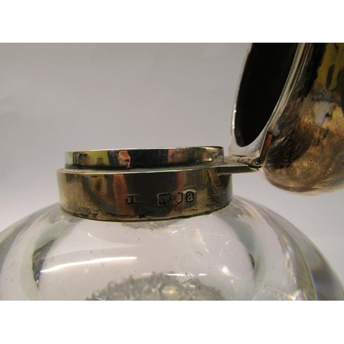 219 - A late Victorian large clear glass inkwell with silver mount and hinged domed cover, makers mark for... 