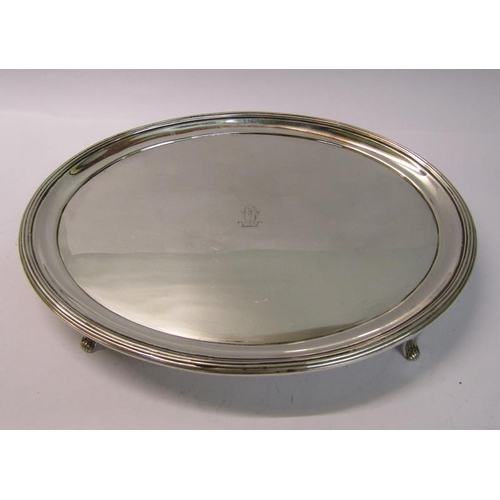 232 - A late Georgian silver salver of oval form with a raised threaded border, makers mark for Peter & Wi... 