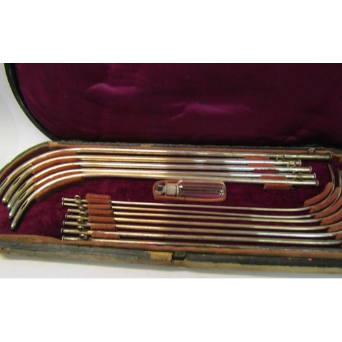 243 - A boxed set of late Victorian silver plated catheters.