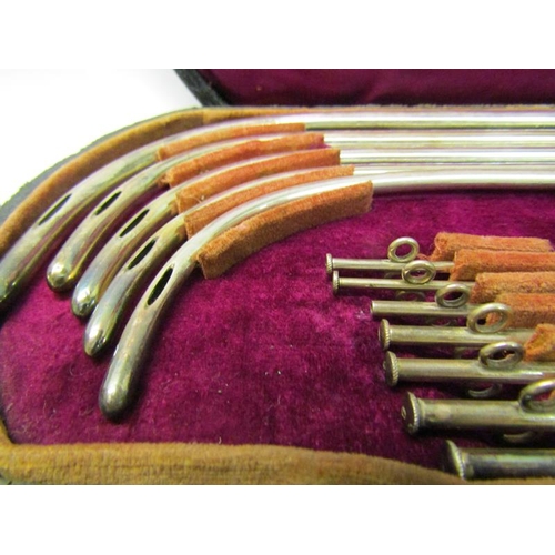 243 - A boxed set of late Victorian silver plated catheters.