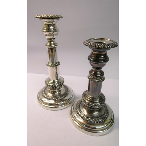 246 - A pair of Old Sheffield plate telescopic candlesticks, c.1820, 19cm h when closed.