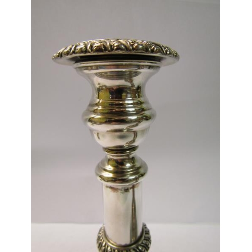 246 - A pair of Old Sheffield plate telescopic candlesticks, c.1820, 19cm h when closed.