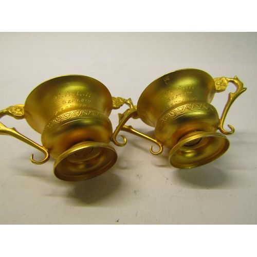 161 - A pair of 19c Italian silver gilt salt cellars of two handled form, Naples 1823/72, .883 grade, toge... 