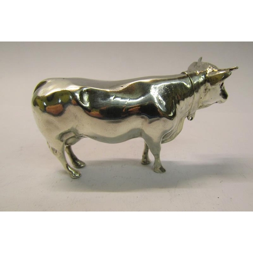 166 - A 19c Dutch silver vesta box in the form of a cow with pull off head, 9cm w.