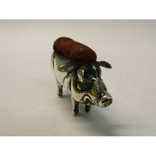 169 - An Edwardian silver pig pin cushion, makers mark for Able & Lovekin, Birmingham 1905, 5.5cm w.