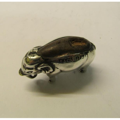 173 - An Edwardian silver elephant pin cushion, makers mark for Skinner & Co, Birmingham 1909, 5cm w.