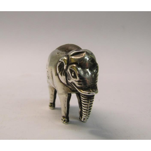 173 - An Edwardian silver elephant pin cushion, makers mark for Skinner & Co, Birmingham 1909, 5cm w.