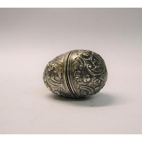 177 - A Victorian silver nutmeg grater box of egg form - the grater mechanism missing, 4.5cm w.