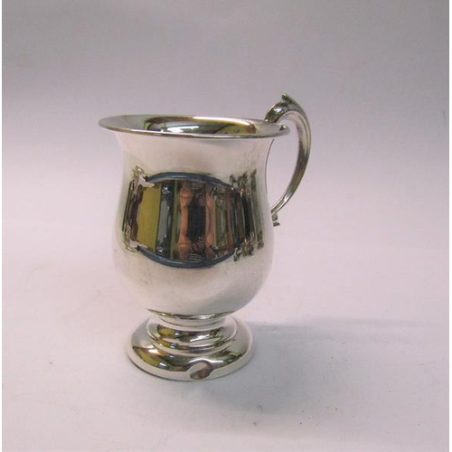 184 - A christening tankard of baluster form with a double scroll handle, makers mark for William Adams, B... 