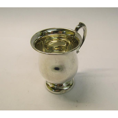 184 - A christening tankard of baluster form with a double scroll handle, makers mark for William Adams, B... 